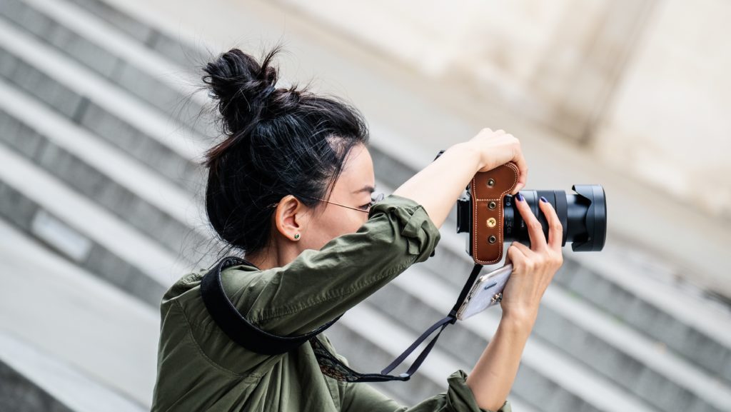 woman taking photos